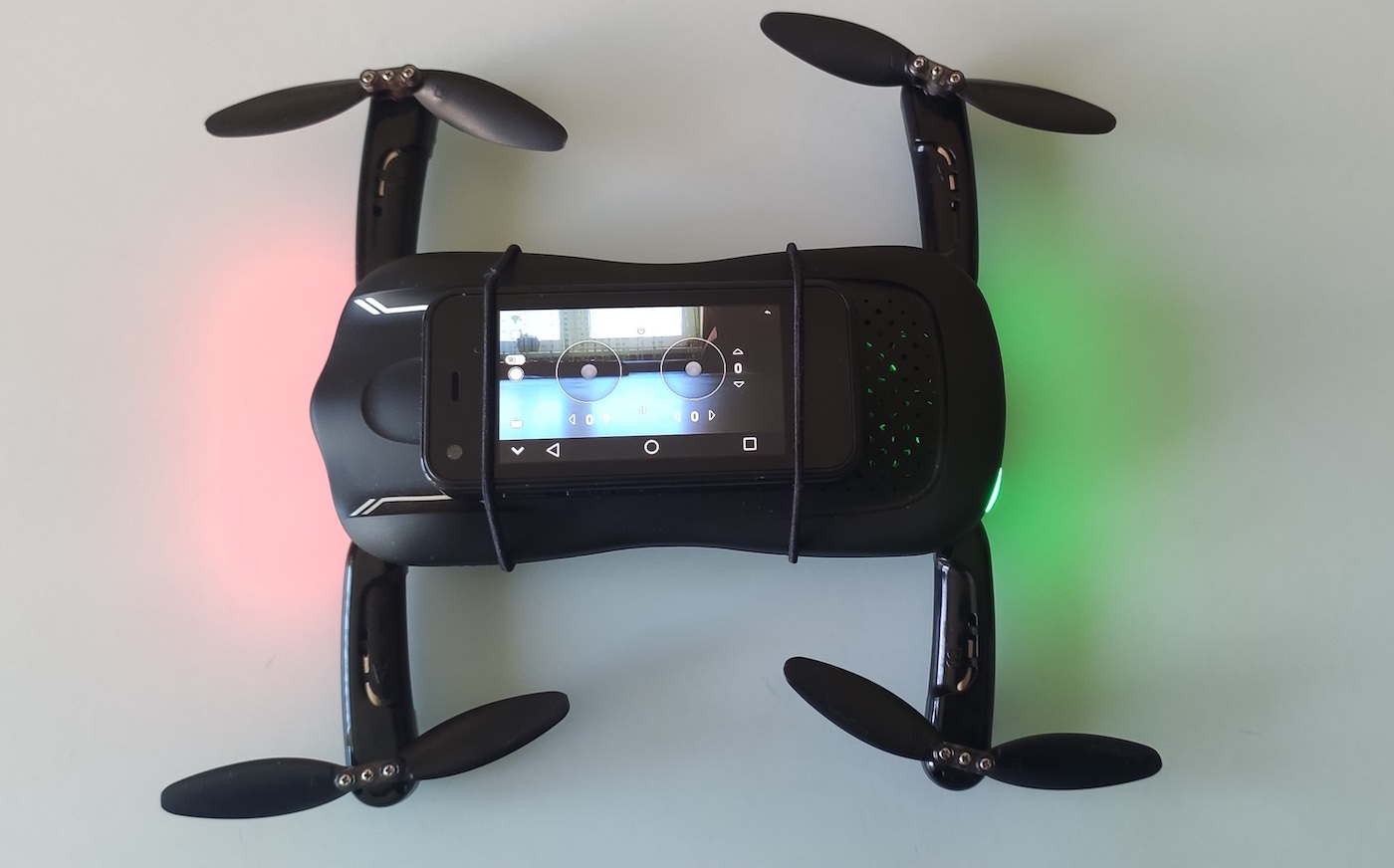 A low-cost indoor drone and a small phone